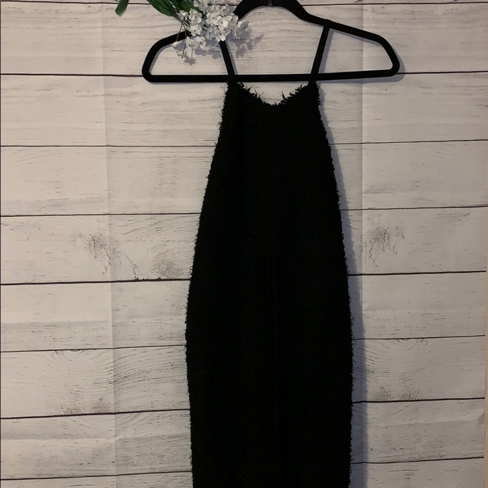 Venera Arapu girls 16 sleeveless black blouse